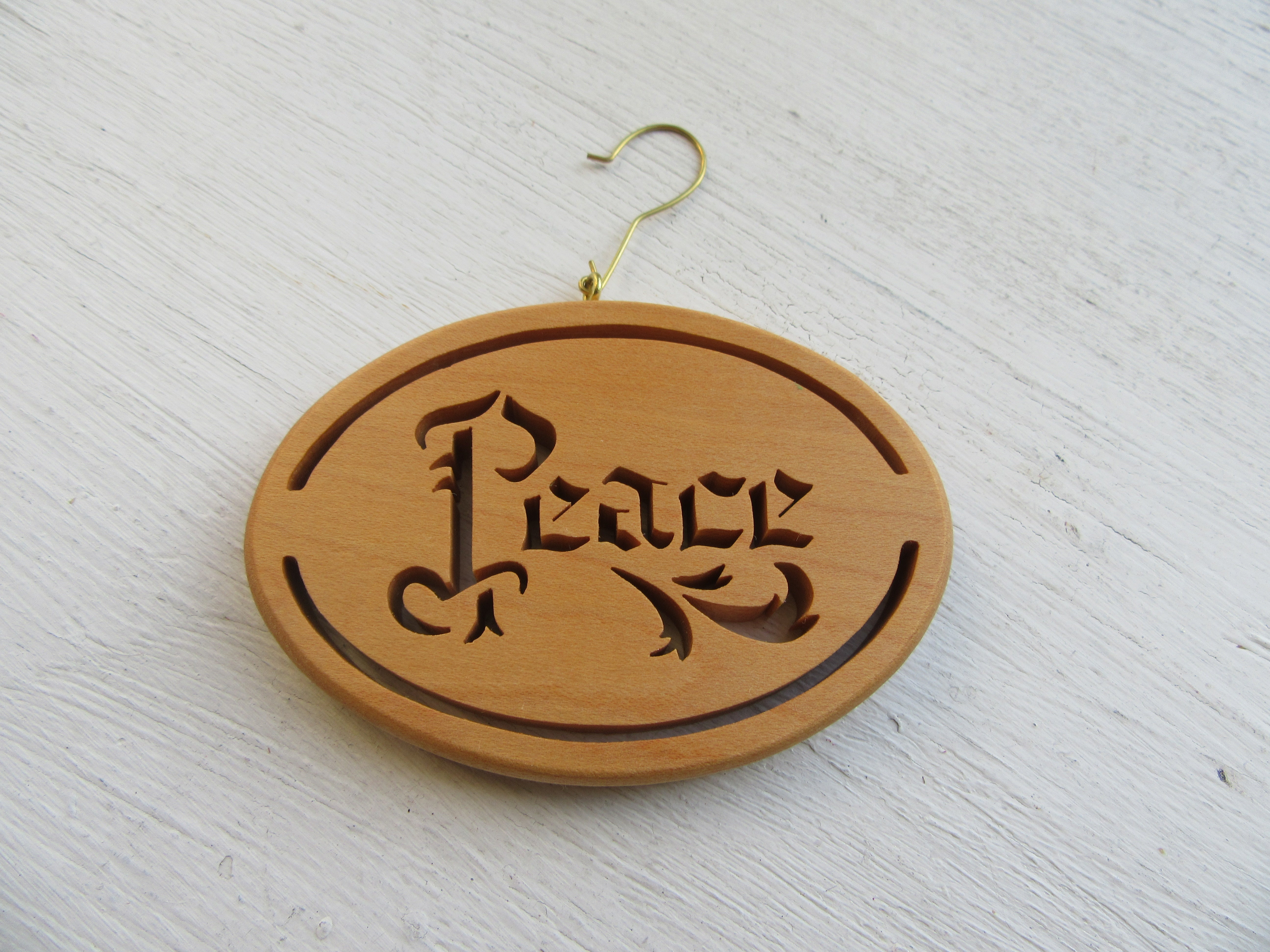 PEACE Ornament Hand Cut from Rock Maple by Artasia