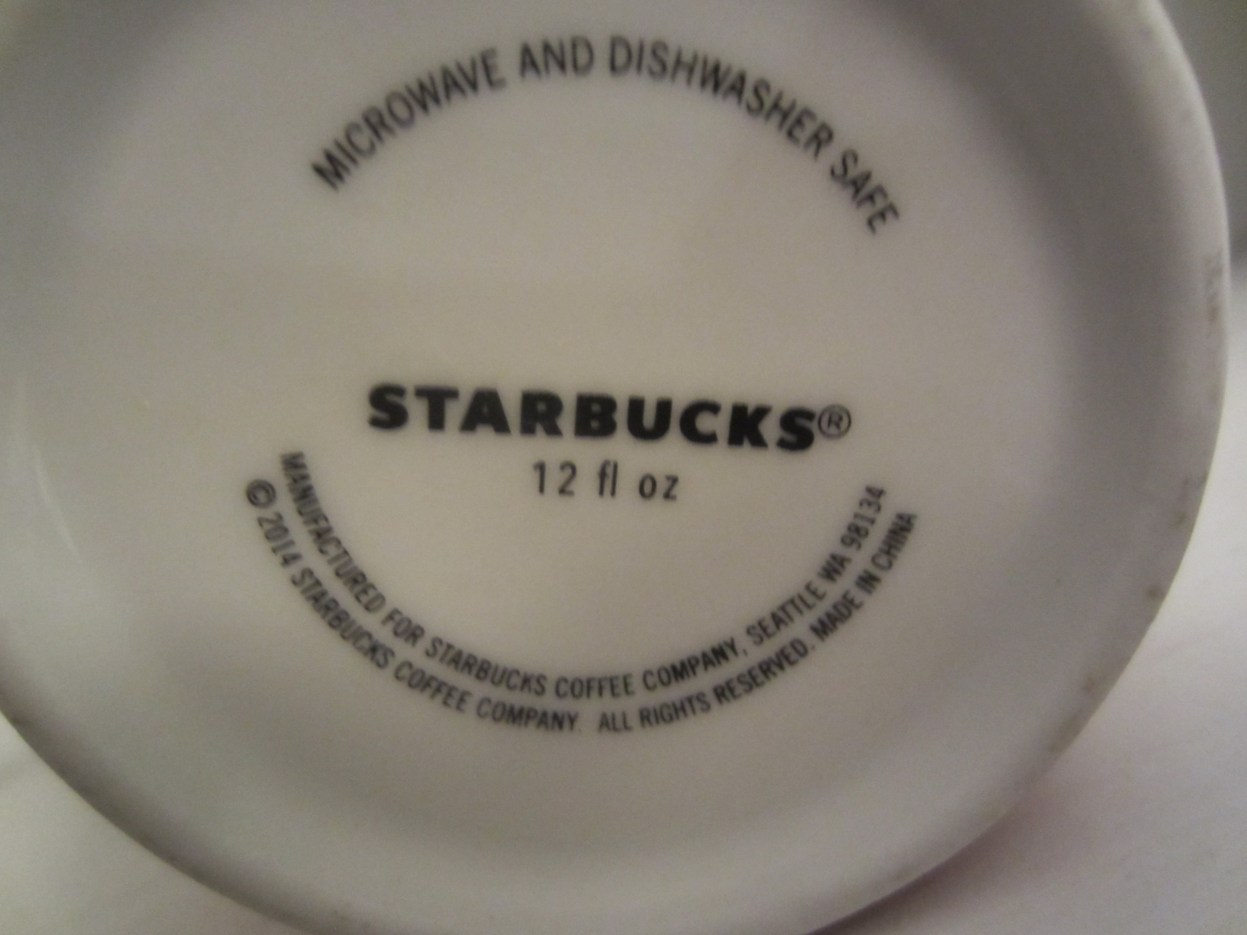 Starbucks 2014 Red Starburst Abstract 12 Ounce Ceramic Mug